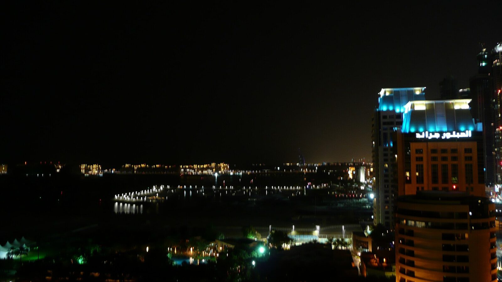 Dubai Marina and the city skyline lit up at night