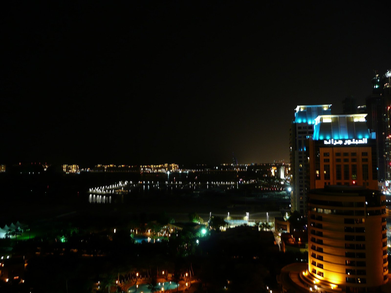 Dubai Marina and the city skyline lit up at night